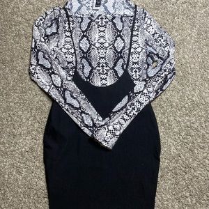 Matching set. Snake skin crop top and short suspender skirt